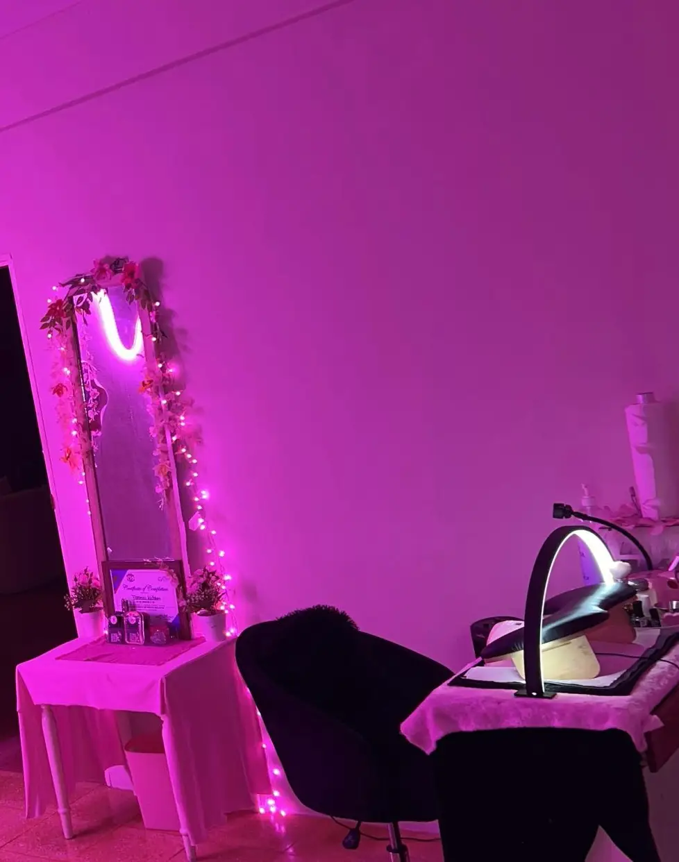 Actual Floral Bloom Beauty Bar mirror and seating area